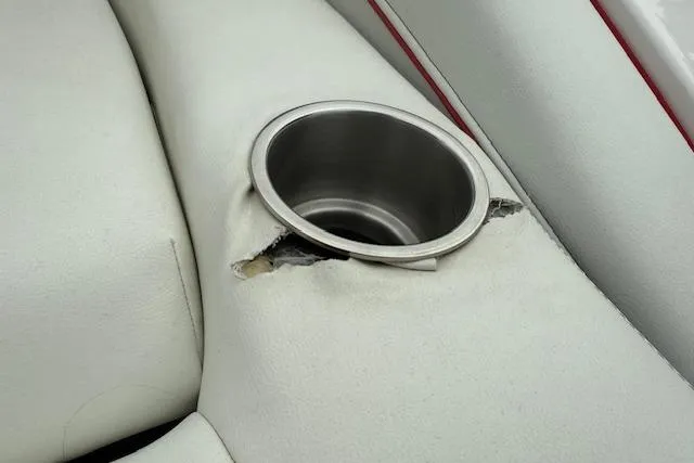 Slide: The Image of Damaged cup holder on 2021 Regal LS4 Surf boat seat. - 33