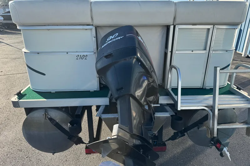 Slide: The Image of 2003 Odyssey Pontoons 2102 Millennium with Mercury 90 outboard motor, rear view. - 23