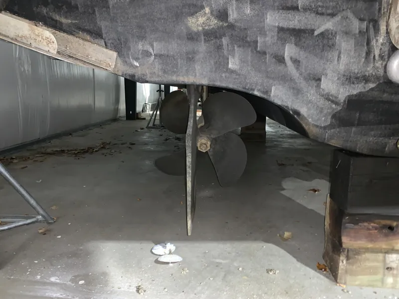 Slide: The Image of Propeller of 2001 Carver 396 Motor Yacht in dry dock, showing underside details. - 7