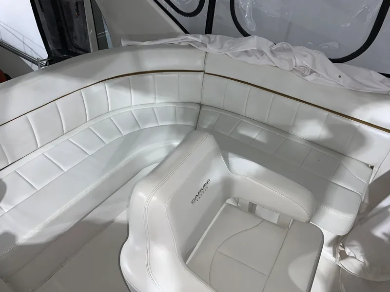 Slide: The Image of White leather seating on 2001 Carver 396 Motor Yacht interior. - 10