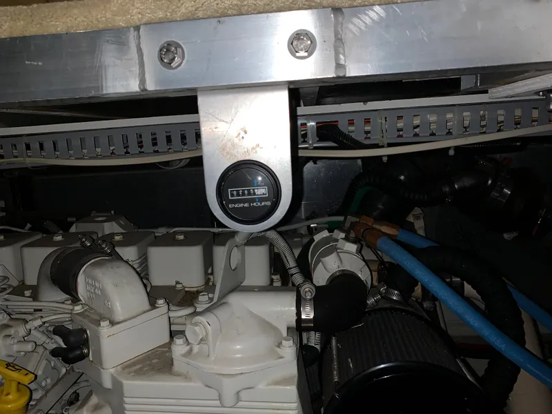 Slide: The Image of Engine room of 2001 Carver 396 Motor Yacht with visible components and wiring. - 20