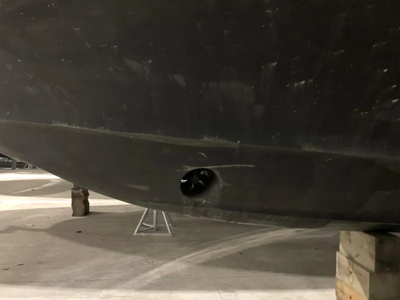 Slide: The Image of Bottom view of a 2001 Carver 396 Motor Yacht hull in dry dock. - 5
