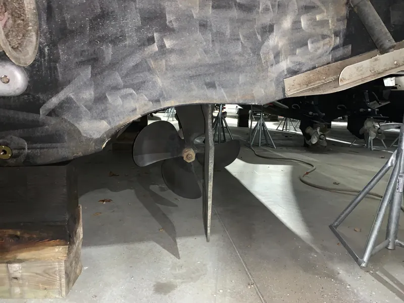 Slide: The Image of 2001 Carver 396 Motor Yacht propeller and hull on dry dock. - 8