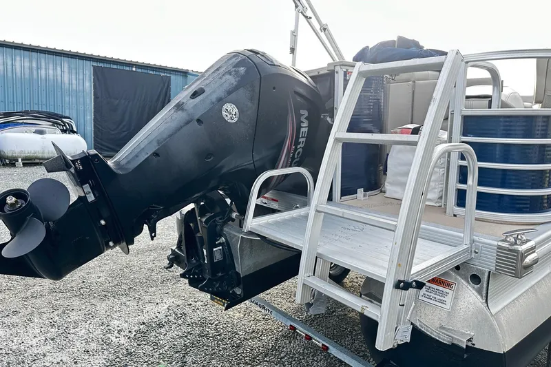 Slide: The Image of 2015 Bennington 2275GS Pontoon with Mercury outboard motor and aluminum ladder. - 3