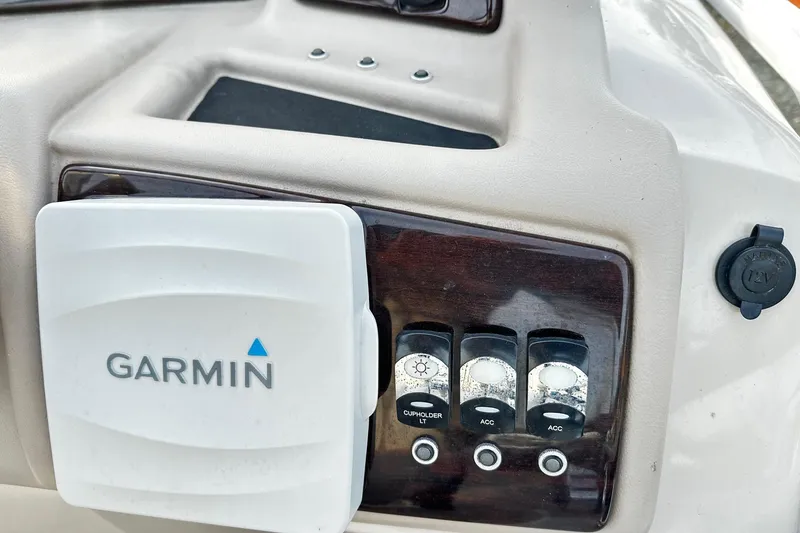 Slide: The Image of Garmin device and controls on 2015 Bennington 2275GS Pontoon dashboard. - 8