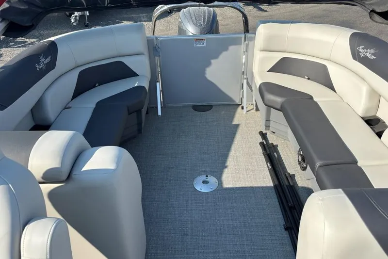Slide: The Image of 2024 SunChaser Geneva Cruise 22 LR PSB pontoon boat interior with spacious seating. - 4
