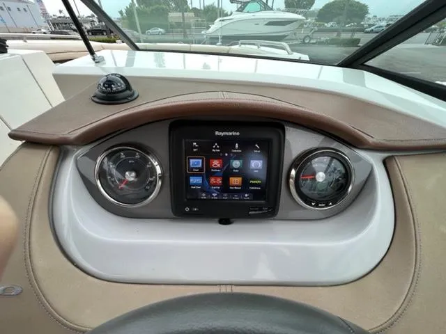 Slide: The Image of Dashboard of 2016 Sea Ray SDX 290 boat with Raymarine display and gauges. - 9