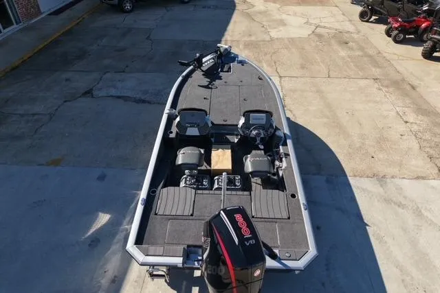 Slide: The Image of 2026 Vexus AVX1985S boat with dual seats and powerful engine, parked on concrete. - 6