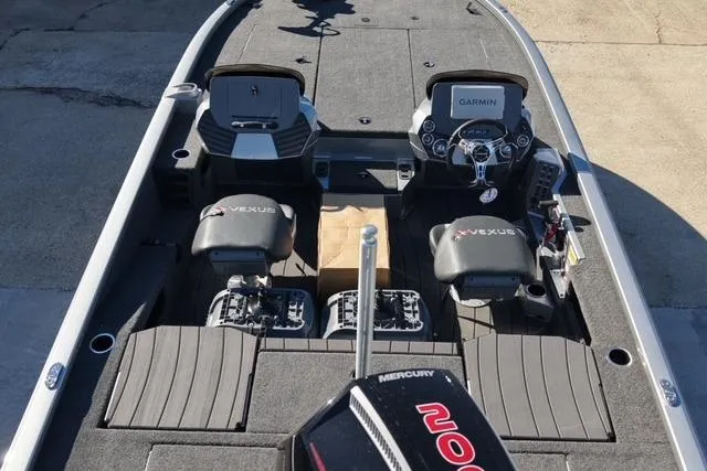 Slide: The Image of 2026 Vexus AVX1985S boat interior with Garmin system and Mercury engine. - 7