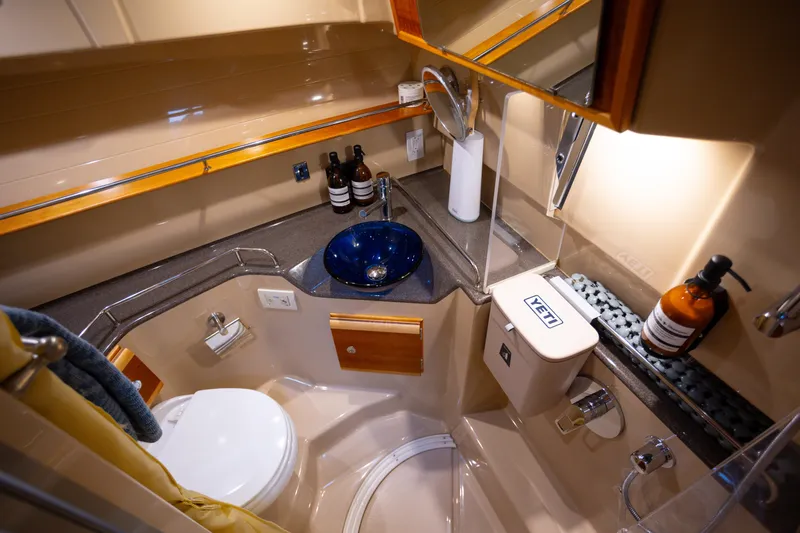 Slide: The Image of Luxurious 2016 Cutwater 30 CB boat bathroom with modern amenities and elegant design. - 12