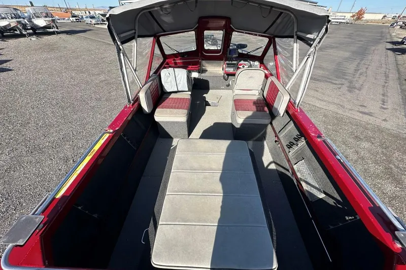 Slide: The Image of 2009 NORTHWEST JET 196 Freedom boat interior with seating and canopy. - 4