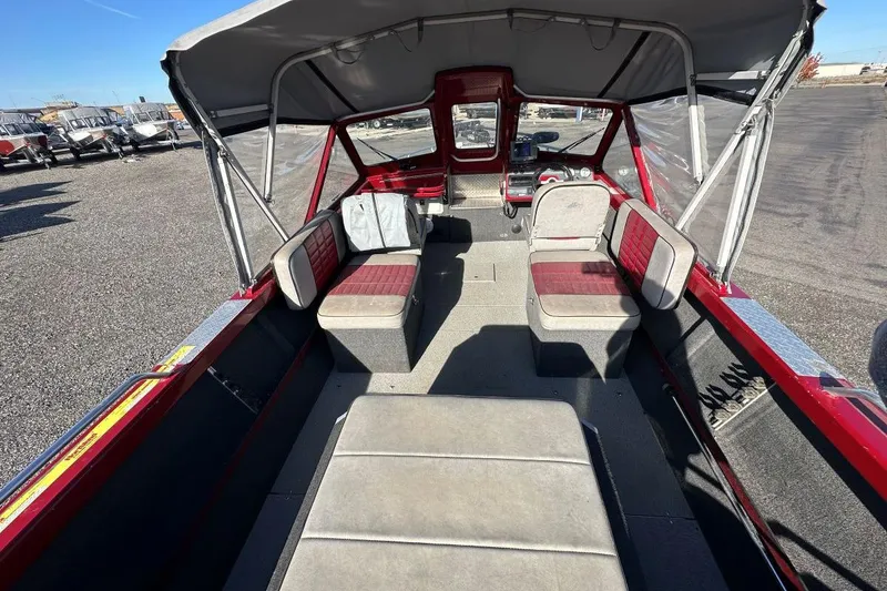 Slide: The Image of Interior of a 2009 NORTHWEST JET 196 Freedom boat with seating and canopy. - 5