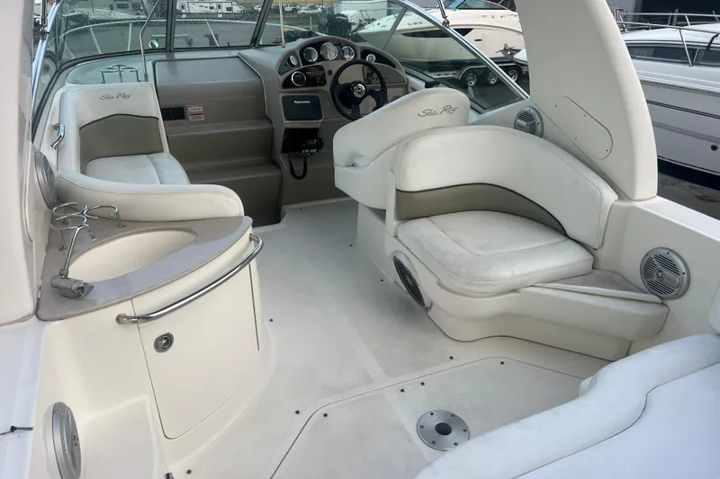 Slide: The Image of 2007 Sea Ray 260 Sundancer boat interior with seating and helm. - 3