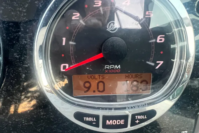 Slide: The Image of Close-up of 2007 Sea Ray 260 Sundancer tachometer showing 9 volts and 186 hours. - 6