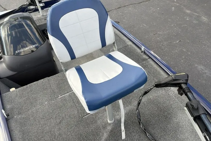 Slide: The Image of 2019 Tracker Pro 170 boat seat and motor on deck. - 29