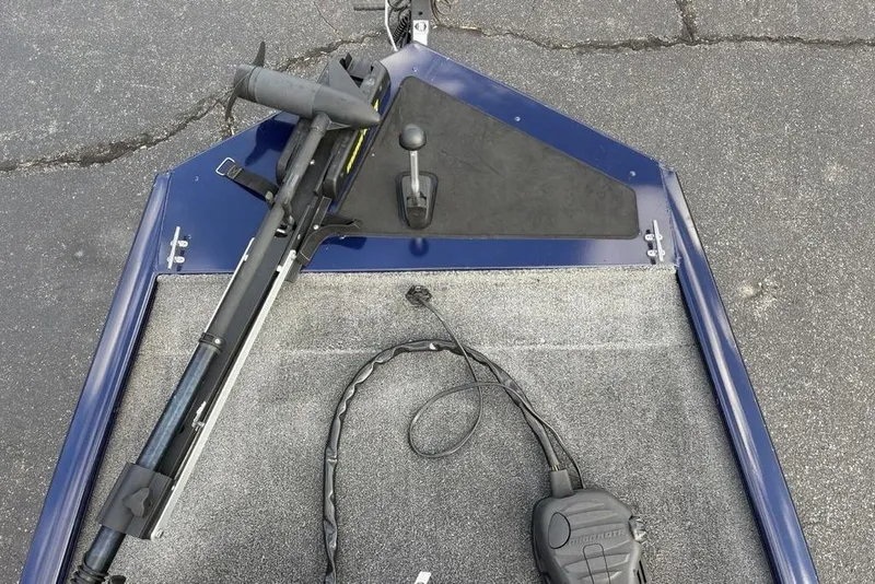 Slide: The Image of 2019 Tracker Pro 170 boat deck with trolling motor and foot pedal. - 5