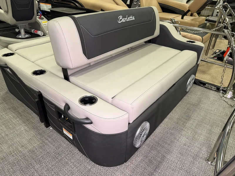 Slide: The Image of The 2026 Barletta Cabrio 24 UE features a luxurious bench seat with integrated speakers. - 36