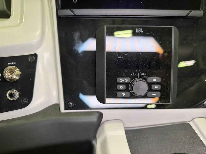 Slide: The Image of Close-up of a JBL audio system on a Barletta Cabrio 24 UE boat. - 21