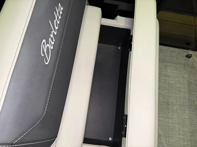 Slide: The Image of Close-up of a seat with Barletta logo and storage space underneath. - 29