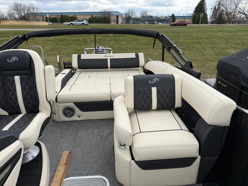 Slide: The Image of Interior of 2026 Barletta Lusso 25 U with luxurious seating. - 13