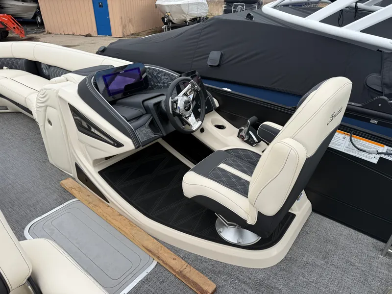 Slide: The Image of Interior of 2026 Barletta Lusso 25 U with luxurious steering wheel and seating. - 8