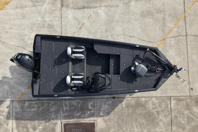 Slide: The Image of Overhead view of 2026 Vexus AVX181 fishing boat on concrete surface. - 4