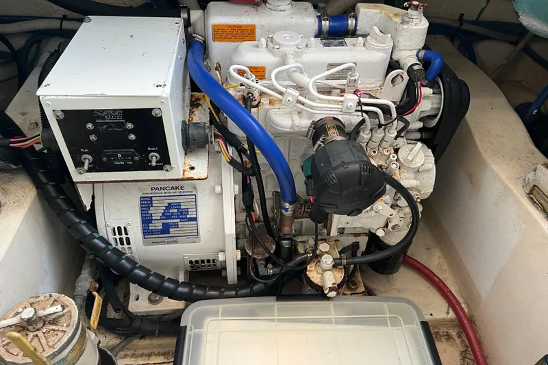 Slide: The Image of Engine compartment of a 2002 Out Island 38 Express Fisherman boat. - 17