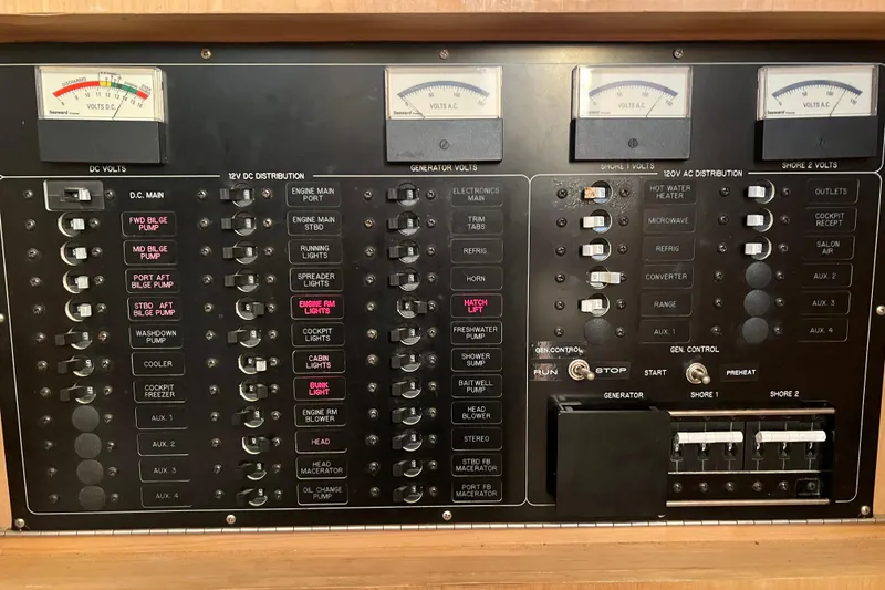 Slide: The Image of Electrical control panel of a 2002 Out Island 38 Express Fisherman boat. - 27