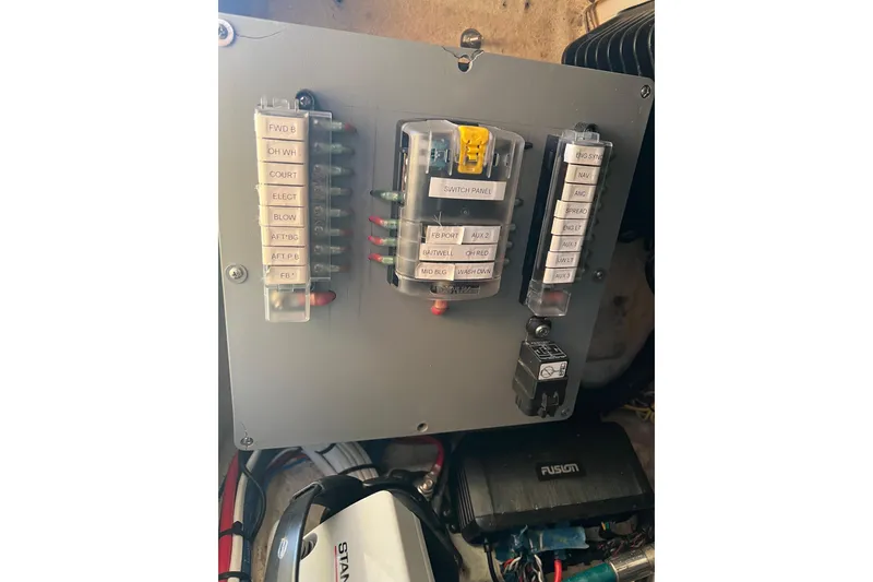 Slide: The Image of Electrical panel on a 2002 Out Island 38 Express Fisherman boat. - 32