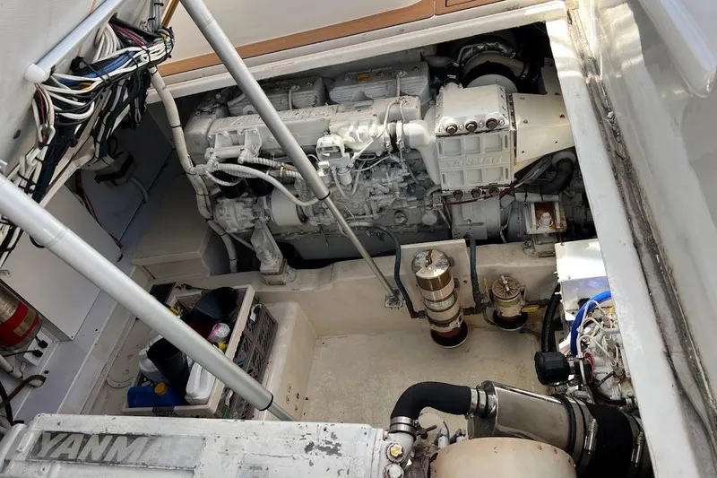 Slide: The Image of Engine compartment of 2002 Out Island 38 Express Fisherman boat with Yanmar engine. - 8