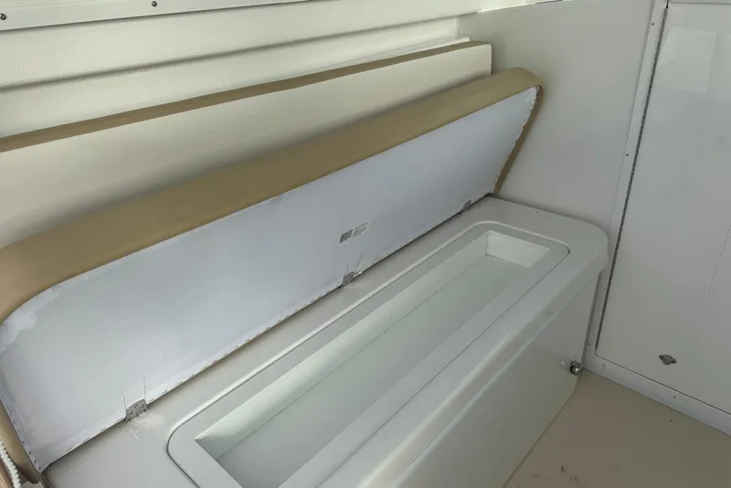 Slide: The Image of Interior view of 2026 Steiger Craft 21 MIAMI boat with storage compartment. - 15