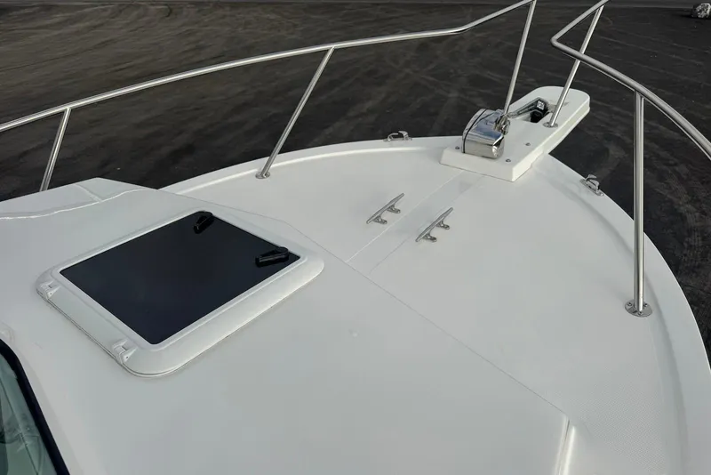 Slide: The Image of 2026 Steiger Craft 21 MIAMI boat deck with hatch and railing. - 9