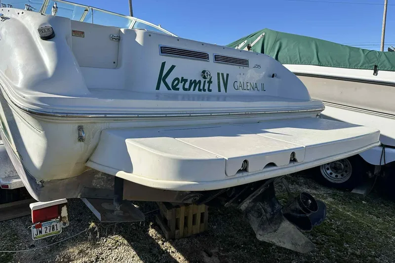 Slide: The Image of 2000 Sea Ray 215 Express Cruiser boat, rear view, labeled "Kermit IV" from Galena, IL. - 10