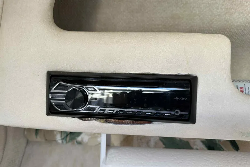 Slide: The Image of Audio system in 2000 Sea Ray 215 Express Cruiser, featuring WMA/MP3 playback. - 14