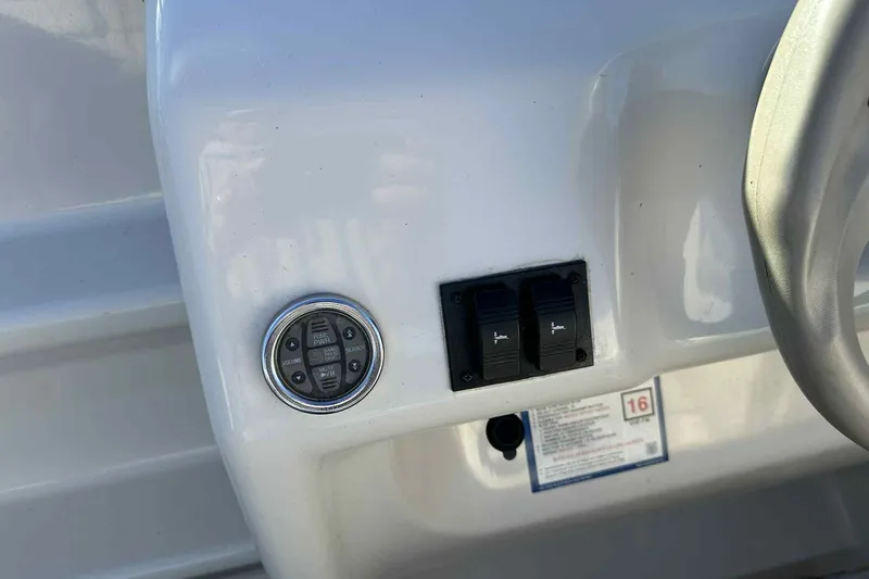 Slide: The Image of Control panel of a 2000 Sea Ray 215 Express Cruiser boat. - 5