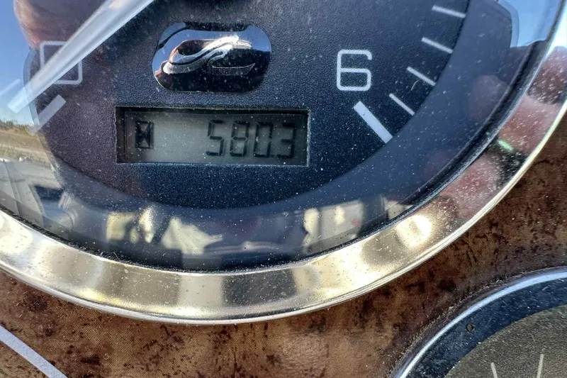 Slide: The Image of Close-up of Sea Ray 215 Express Cruiser 2000 hour meter showing 580.3 hours. - 6