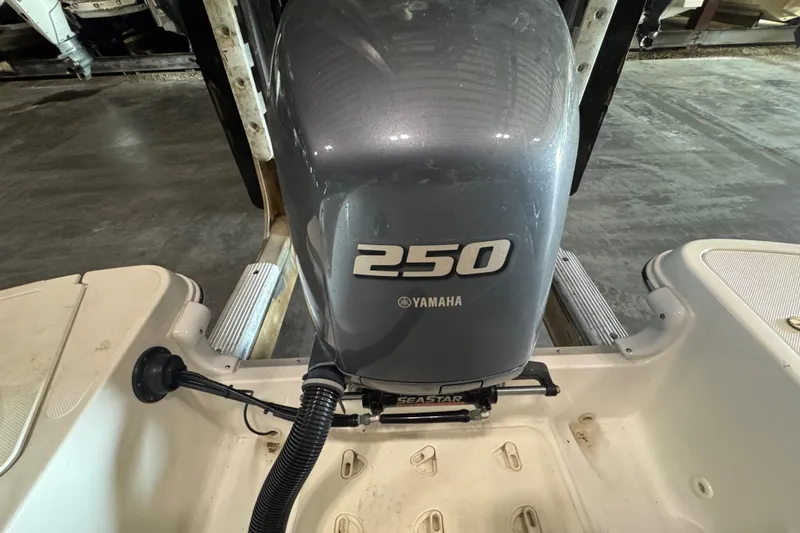 Slide: The Image of Yamaha 250 outboard motor on 2014 Hurricane SunDeck 2400 OB boat. - 17