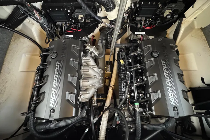 Slide: The Image of 2023 Yamaha AR250 boat engine compartment with dual high-output engines. - 25