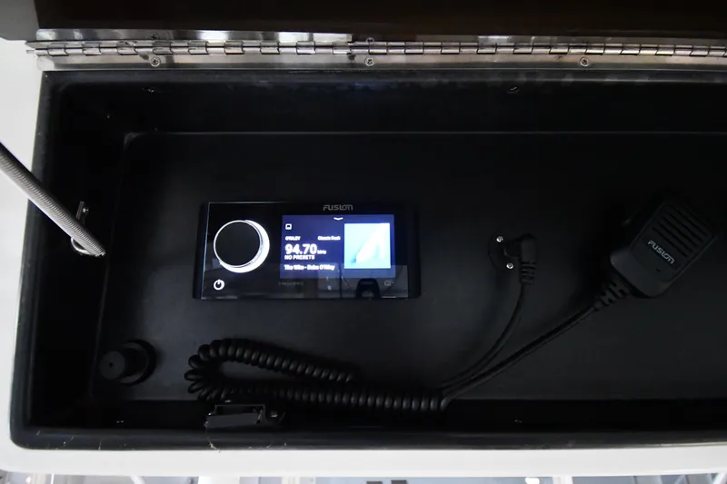 Slide: The Image of Fusion audio system in 1996 Viking 50 Convertible boat dashboard. - 24