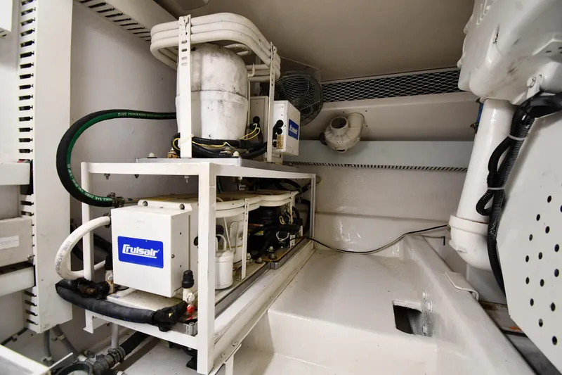 Slide: The Image of Engine room of 1996 Viking 50 Convertible yacht with Cruisair system. - 67