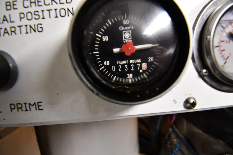 Slide: The Image of Engine hour meter on 1996 Viking 50 Convertible, showing 2327 hours. - 74