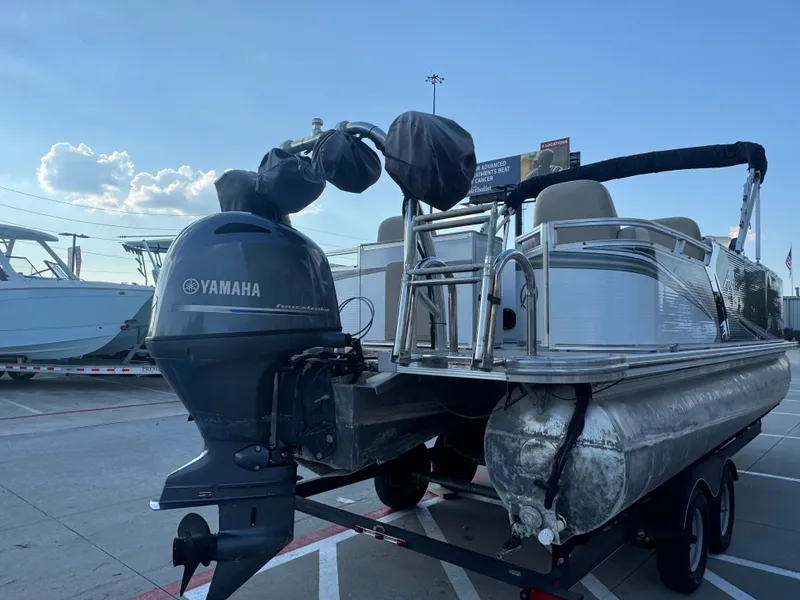 Slide: The Image of 2017 Avalon LSZ rf 2285 pontoon boat with Yamaha outboard motor on trailer. - 5