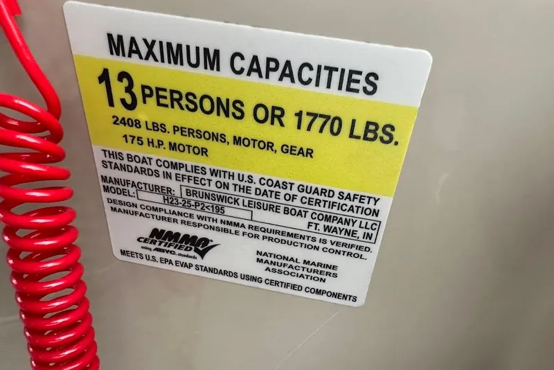 Slide: The Image of Capacity label on 2023 Harris 230 CRUISER, max 13 persons or 1770 lbs, 175 HP motor. - 28