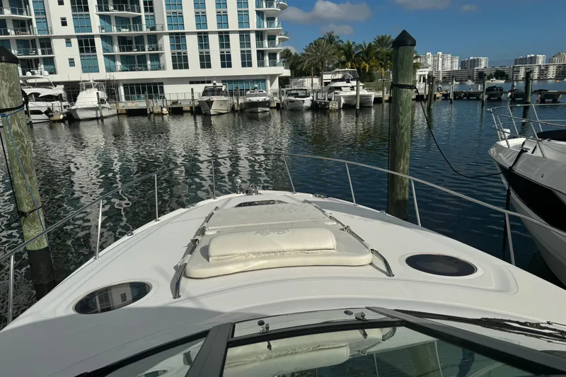 Slide: The Image of 2008 Sea Ray 340 Sundancer docked at marina with waterfront view. - 6