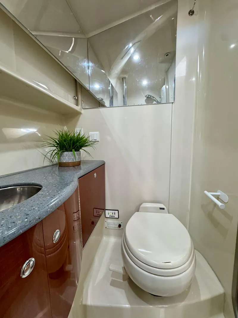 Slide: The Image of 2006 Formula 40pc yacht bathroom with modern fixtures and countertop plant. - 25