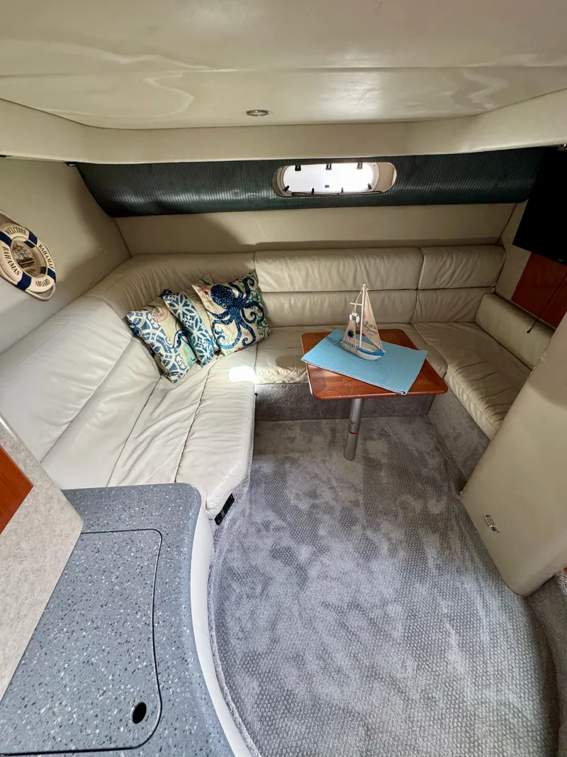 Slide: The Image of 2006 Formula 40pc yacht interior with plush seating and decorative pillows. - 29
