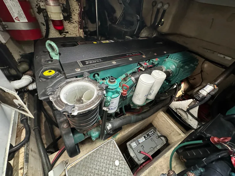 Slide: The Image of Engine compartment of a 2006 Formula 40pc boat, featuring a well-maintained engine. - 35