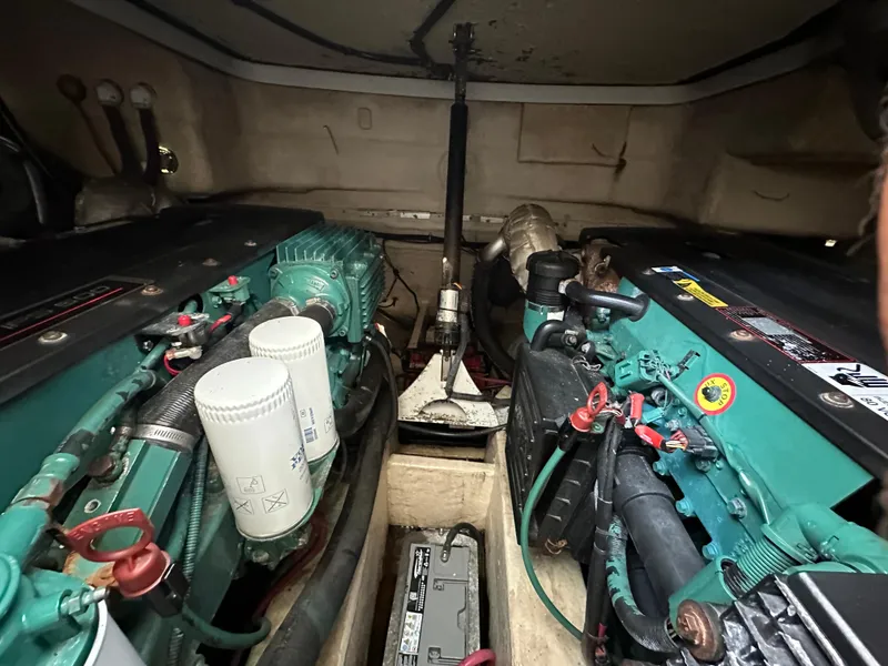 Slide: The Image of Engine room of a 2006 Formula 40pc boat, showcasing dual engines and components. - 38