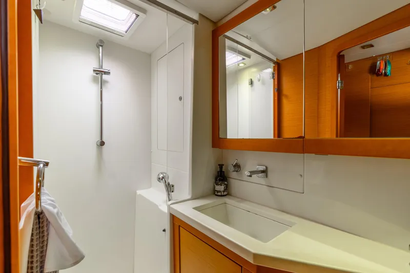 Slide: The Image of Modern bathroom interior on 2013 Lagoon 450 yacht, featuring shower and sink. - 108