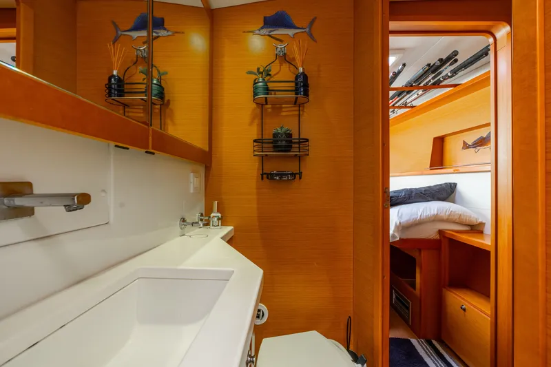 Slide: The Image of Luxurious 2013 Lagoon 450 yacht interior with modern bathroom and cozy bedroom. - 109
